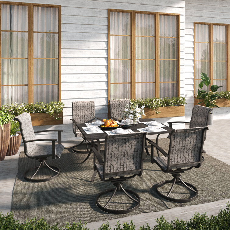 Patio table with 2025 6 swivel chairs